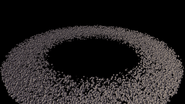 A wide ring of thousands of small pale-grey rocks seen at a shallow angle against black, thousands deep, with an empty hole at its centre and the far side of the ring receding towards the top of the frame.