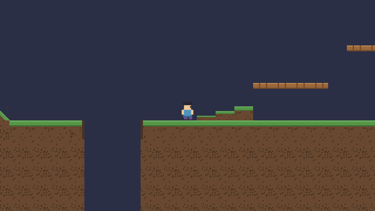 A side-on pixel-art platformer level at dusk: a grassy earth floor with a dusk-blue pit cut through it on the left, a small blue-suited runner standing beside a flight of three low grassy steps, and two rows of wooden planks floating above and to the right.